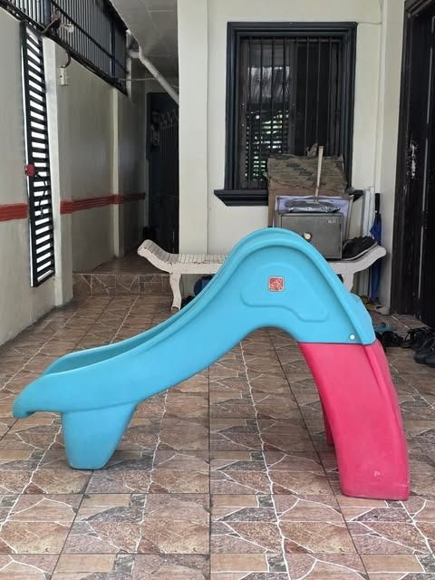 Step2 Toddler Slide - Teal & Red (Category: Infant Playtime) located in Manila. Submitted by trendsettershoppe (Listing ID 1408297463, Image 1). Description: Step2 Toddler Slide - Teal & Red ​Description: -Selling a durable Step2 slide in good used condition. -Perfect for toddlers to burn off energy indoors or outdoors! -​Safe Design: Features high side rails and easy-to-climb steps for little ones. ​ ​Condition: Structurally sound with normal si