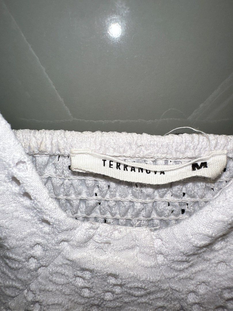 Terranova White Dress - Size M (Category: Dresses) located in Marikina City. Submitted by prelovedbyerickaa (Listing ID 1408259675, Image 2). Description: – 9/10 🌟 Onhand – No return, no exchange, & no refund 🤍 – SF NOT included – MOP: BDO/ gcash – MOD: lalamove/ j&t - Terranova white dress - Size: M Features: - V-neckline - Adjustable straps - Tiered skirt - Design: Textured fabric with eyelet details - Style: Fitted bodice, flared skirt - Per