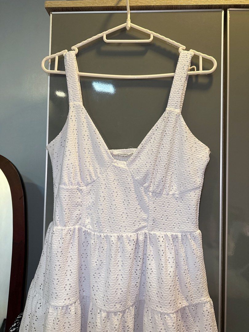 Terranova White Dress - Size M (Category: Dresses) located in Marikina City. Submitted by prelovedbyerickaa (Listing ID 1408259675, Image 3). Description: – 9/10 🌟 Onhand – No return, no exchange, & no refund 🤍 – SF NOT included – MOP: BDO/ gcash – MOD: lalamove/ j&t - Terranova white dress - Size: M Features: - V-neckline - Adjustable straps - Tiered skirt - Design: Textured fabric with eyelet details - Style: Fitted bodice, flared skirt - Per