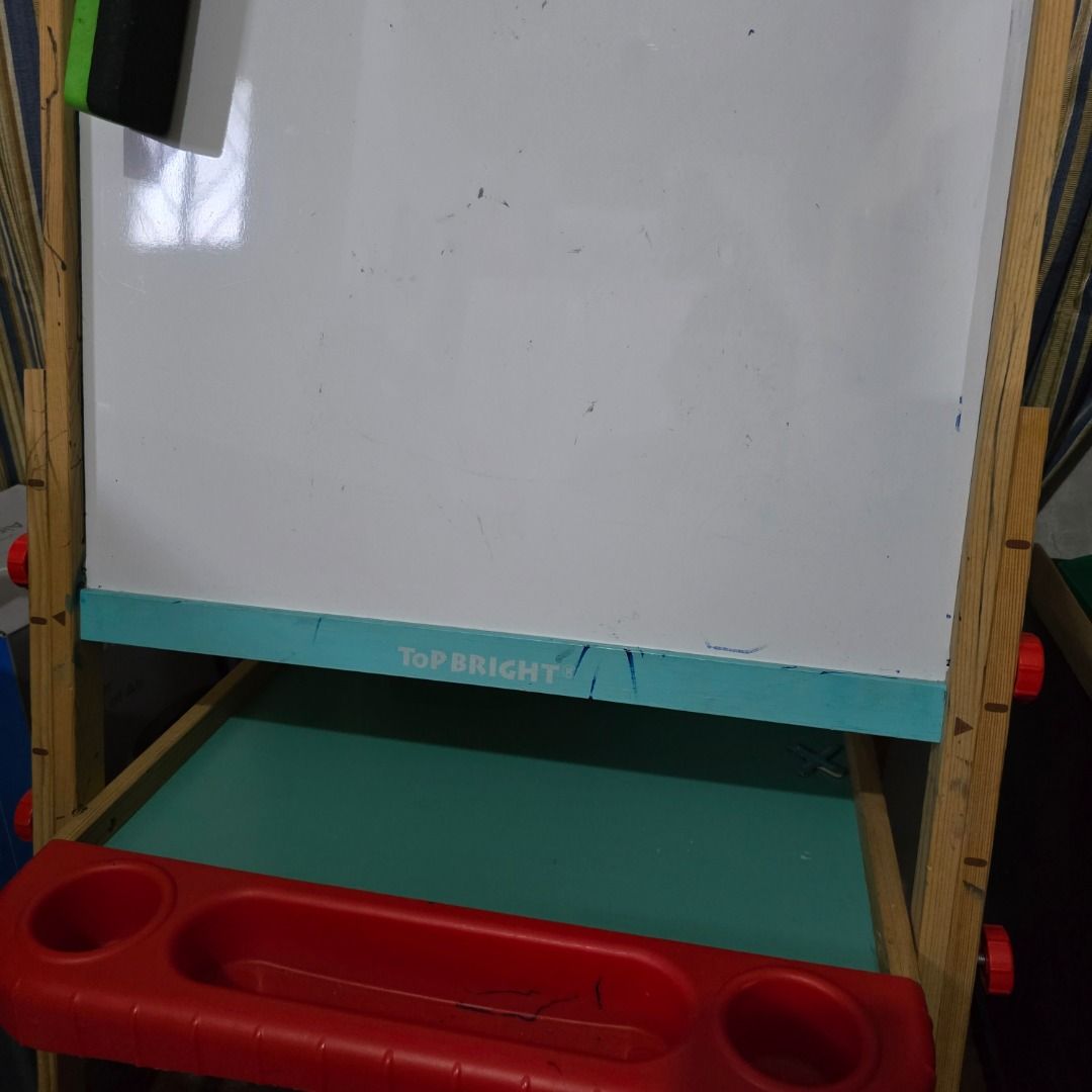 Top Bright Wooden Easel (Category: Craft Supplies & Tools) located in Subic. Submitted by lucky_jayden_authenticitems (Listing ID 1408205531, Image 2). Description: Complete parts with signs of use from markers. Overall 90% goods Original price 2,800.