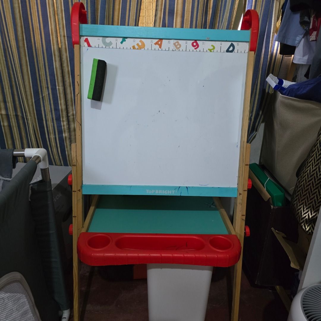 Top Bright Wooden Easel (Category: Craft Supplies & Tools) located in Subic. Submitted by lucky_jayden_authenticitems (Listing ID 1408205531, Image 1). Description: Complete parts with signs of use from markers. Overall 90% goods Original price 2,800.
