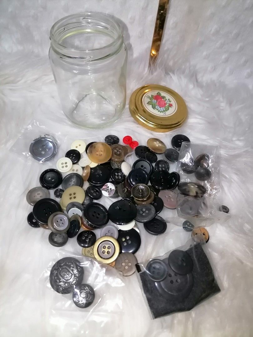 Vintage Button Collection in Jar (Category: Craft Supplies & Tools) located in Butuan. Submitted by az-branded.items (Listing ID 1408295441, Image 2). Description: Collection of various vintage buttons in different sizes, shapes, and colors. Includes buttons in a jar with a decorative lid. Some buttons are still in their original packaging. The collection includes black, white, beige, and brown buttons. Perfect for sewing, crafts, or collecting..