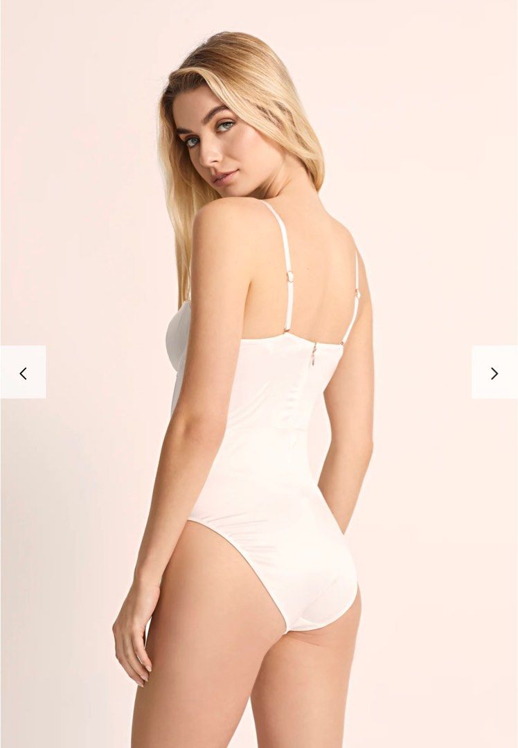 White Bodysuit with Robes Lace (Category: Undergarments & Loungewear) located in Subic. Submitted by belaeilish (Listing ID 1408165283, Image 3). Description: - White bodysuit with sweetheart neckline - Adjustable straps - Smooth, satin-like finish - Includes sheer, long lace robe - Intricate floral detailing on robe - Wide sleeves and delicate lace trim on robe - Ideal for special occasions.