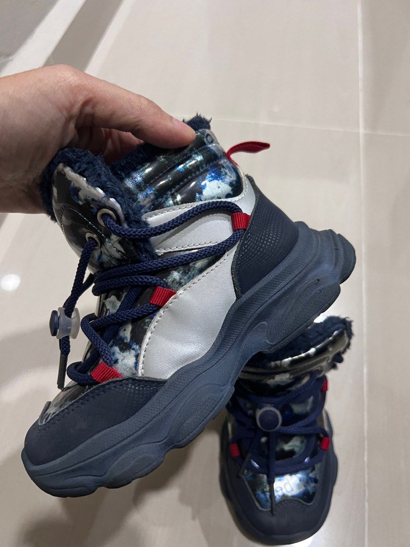 Winter Boots Midcut Size 29 (Category: Babies & Kids Fashion) located in Ampang. Submitted by rarahanna (Listing ID 1408192985, Image 2). Description: - Navy blue and silver design - Size: 29 - Warm faux fur lining - Chunky sole for grip - Lace-up closure - Ready for winter adventures! - Add rm8 for postage!.