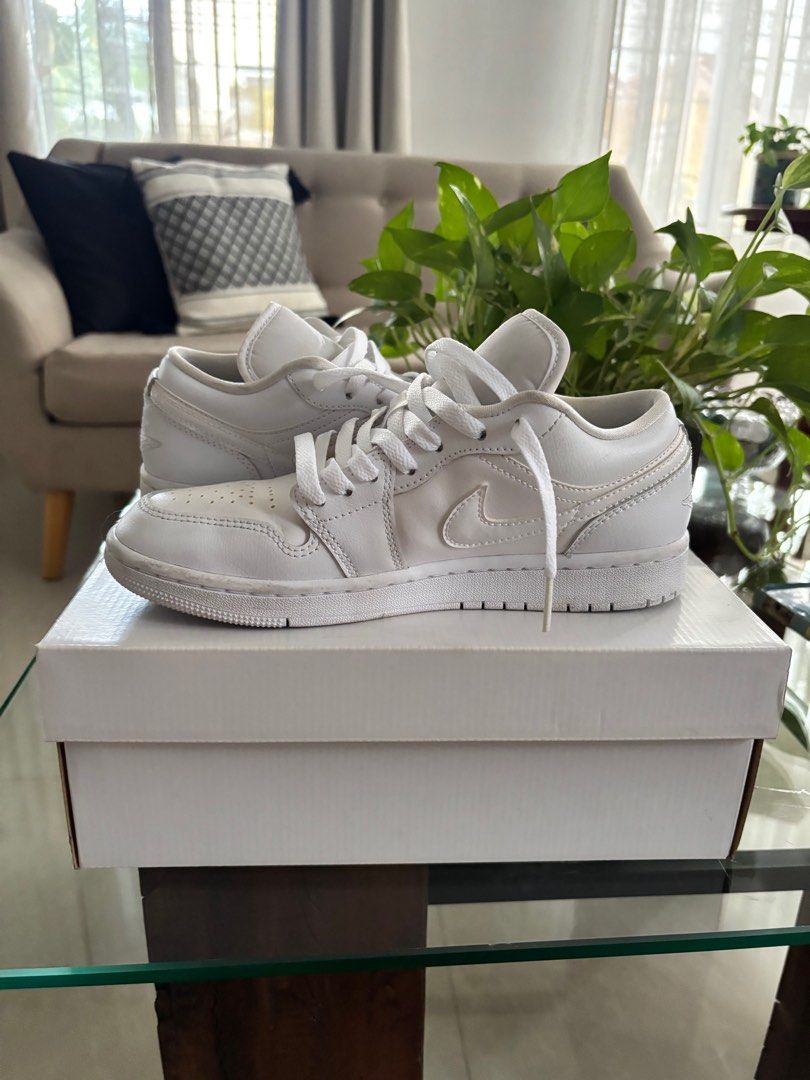 WMNS Air Jordan 1 Low Triple White (Category: Sneakers) located in Makati City. Submitted by jca925 (Listing ID 1408169765, Image 3). Description: WMNS Air Jordan 1 Low sneakers - Size: 7.5 US - Color: Triple White - White laces and sole - Includes original box with Jordan logo .