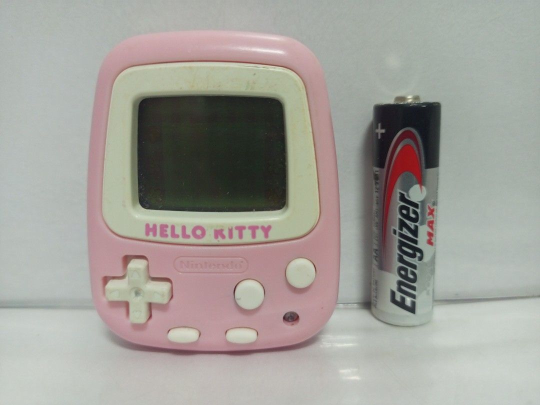 1998 Nintendo Sanrio Hello Kitty Pocket Game (Category: Nintendo) located in Quezon City. Submitted by mackylolz (Listing ID 1408327022, Image 1). Description: 1998 Nintendo Sanrio Hello Kitty Pocket Game Working and Tested Japanese Language 1pc CR2032 Battery (Not included) What you See is what u Get Pls See pic for Details.