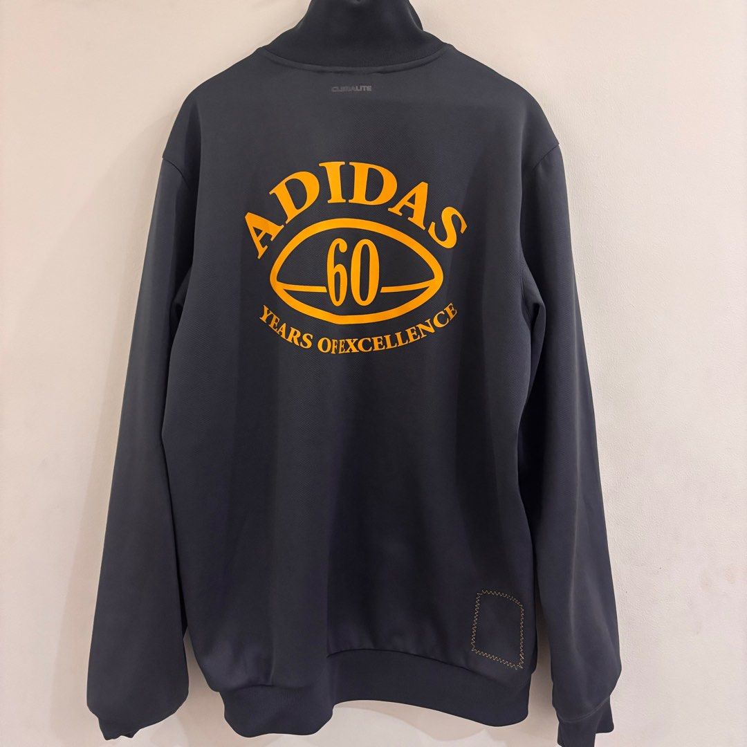 Adidas 60th Anniversary Climalite Track Jacket Zip Up (Category: Coats, Jackets and Outerwear) located in Cebu City. Submitted by trism (Listing ID 1408403890, Image 2). Description: L on tag, fits a M to L (japan size) approx width: 21” length: 26” (shoulder to bottom).