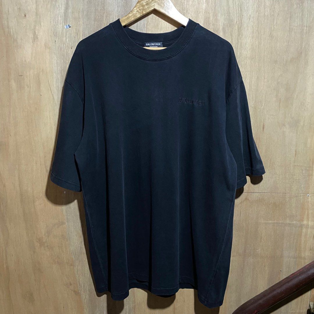 Balenciaga Embroidered script Black T-shirt (Category: Tshirts & Polo Shirts ) located in Manila. Submitted by drp4drp (Listing ID 1408429942, Image 1). Description: Dimes: Length 31 x Width 25 - Black color - Embroidered Balenciaga logo (front & back) - From the Wardrobe collection - Unisex - Size: L to XXL - Made in Portugal - No issues - Crew neck - Short sleeves.