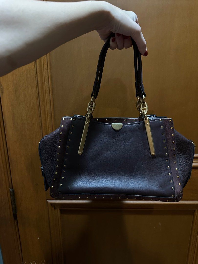 Coach Dreamer 36 With Rivets Handbag (Category: Luxury Bags & Wallets) located in Muntinlupa City. Submitted by toomuchstuff17 (Listing ID 1408464019, Image 3). Description: Was given to me as a gift by SSI a few years ago Only used it during one trip to the states. OG price : 35k .