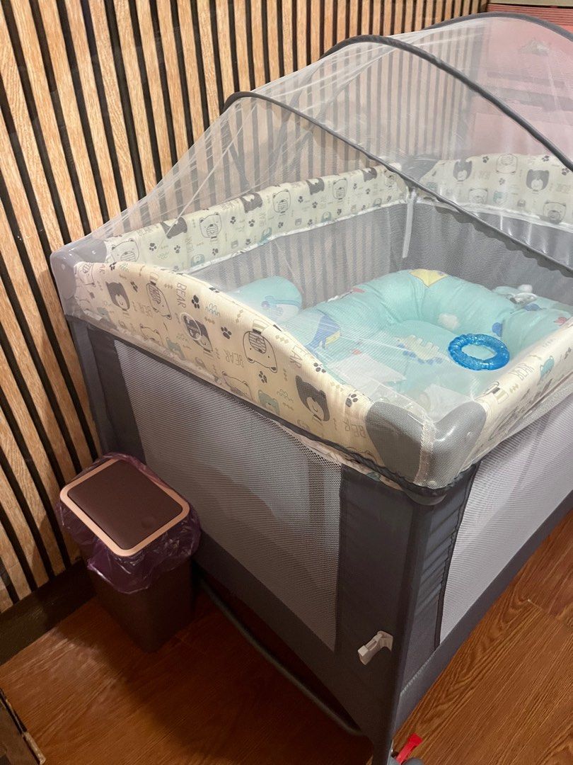 Cocobb Crib with Rocker, kulambo (Category: Cots & Cribs) located in Quezon City. Submitted by _____sopii (Listing ID 1408494603, Image 2). Description: - Baby crib with mosquito net - Includes mattress, pillows, and baby toy - Gray frame with wheels for easy movement - Provides protection from insects - Features a cute bear pattern - di kasama yung foam na bed seat - Di nagagamit si baby nag cocosleep samin.