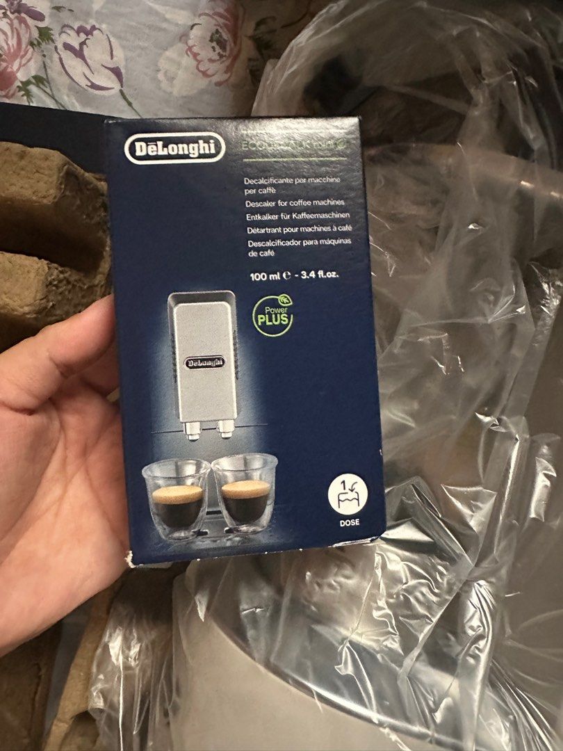 DeLonghi Dedica Style Espresso Coffee Maker (Category: Coffee Machines & Makers) located in Manila. Submitted by konami_bjork (Listing ID 1408456406, Image 3). Description: Brand New DeLonghi Dedica Style espresso and cappuccino coffee maker. Includes a descaler for coffee machines. Comes with accessories and manuals. Features a milk frothing wand for creating cappuccinos. The machine is white and silver in color. Includes the original box and pa