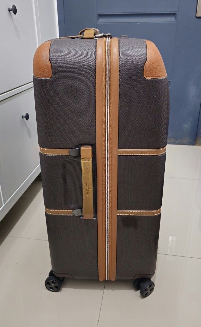 Delsey Chatelet Large Luggage Suitcase (Category: Luggage) located in Rizal. Submitted by dailyfindsphl (Listing ID 1408390195, Image 3). Description: Delsey Chatelet Large Good as new Used twice Dimensions : H 77 x L 53.5 x D 32.5cm Capacity : 112L Weight : 5.1kg - Delsey luggage suitcase - Brown and tan accents - Multiple interior compartments with zippered closures - Wheels for easy transport - Carrying handle - Textured exterior finish - Redd
