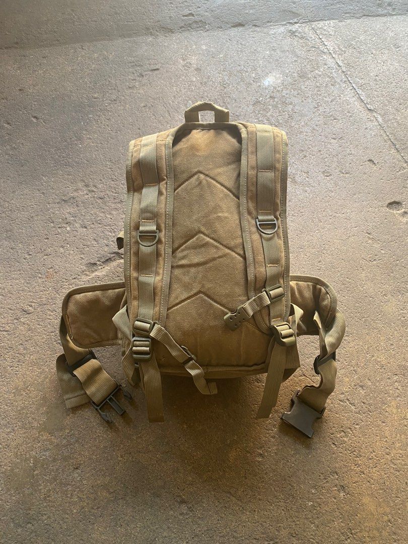 Diesel Canvas Backpack (Category: Backpacks) located in Mabalacat. Submitted by carlatencredi (Listing ID 1408383041, Image 2). Description: - Diesel backpack - Tan color - Multiple compartments - Adjustable straps - Zipper closure main compartment - Several smaller pockets - Diesel logo on front and inside - Durable canvas material -Flaws: Inside zipper see last photo, Need rewash..