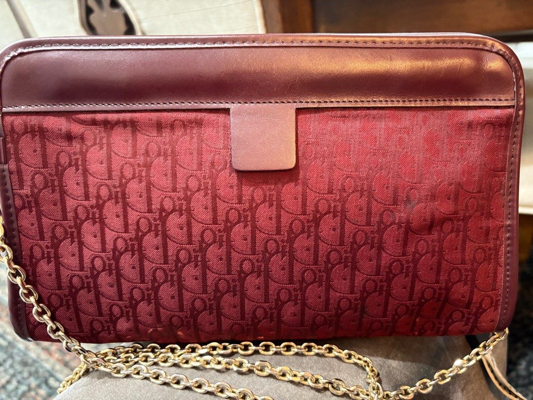 Dior clutch pouch sling (Category: Luxury Bags & Wallets) located in Quezon City. Submitted by chynnadollie (Listing ID 1408317704, Image 3). Description: - Authentic Dior shoulder bag - Burgundy monogram pattern - Gold chain strap - Rectangular shape - Leather top - Gold-tone logo - Classic design.