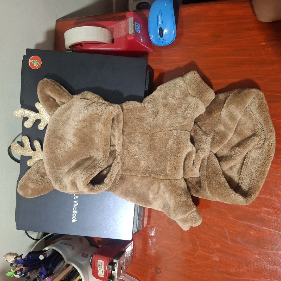 Dog/Cat Reindeer Costume (Category: Homes & Other Pet Accessories) located in Cavite. Submitted by Kal_07 (Listing ID 1408418381, Image 2). Description: Hello! Welcome to our Shop! This just arrived today and I'm selling it for 180 php, It's actually for my cat, but it doesn't fit, so I just planned to sell it instead. Can still lower the price a bit if will get it right away 🥹 Size: Medium Chest (cm): 38 Neck (cm): 29 Back Length (cm): 30 Weigh