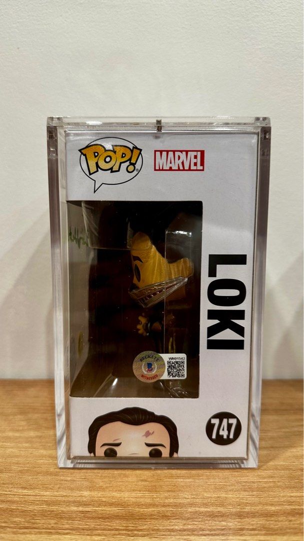 Funko Loki Tesseract signed by Tom Hiddleston (Category: Designer & Blind Box Toys) located in Antipolo. Submitted by agentjic (Listing ID 1408335071, Image 2). Description: 747 Loki Tesseract Funko Shop Gitd signed by Tom Hiddleston with Beckett COA-₱31,500.