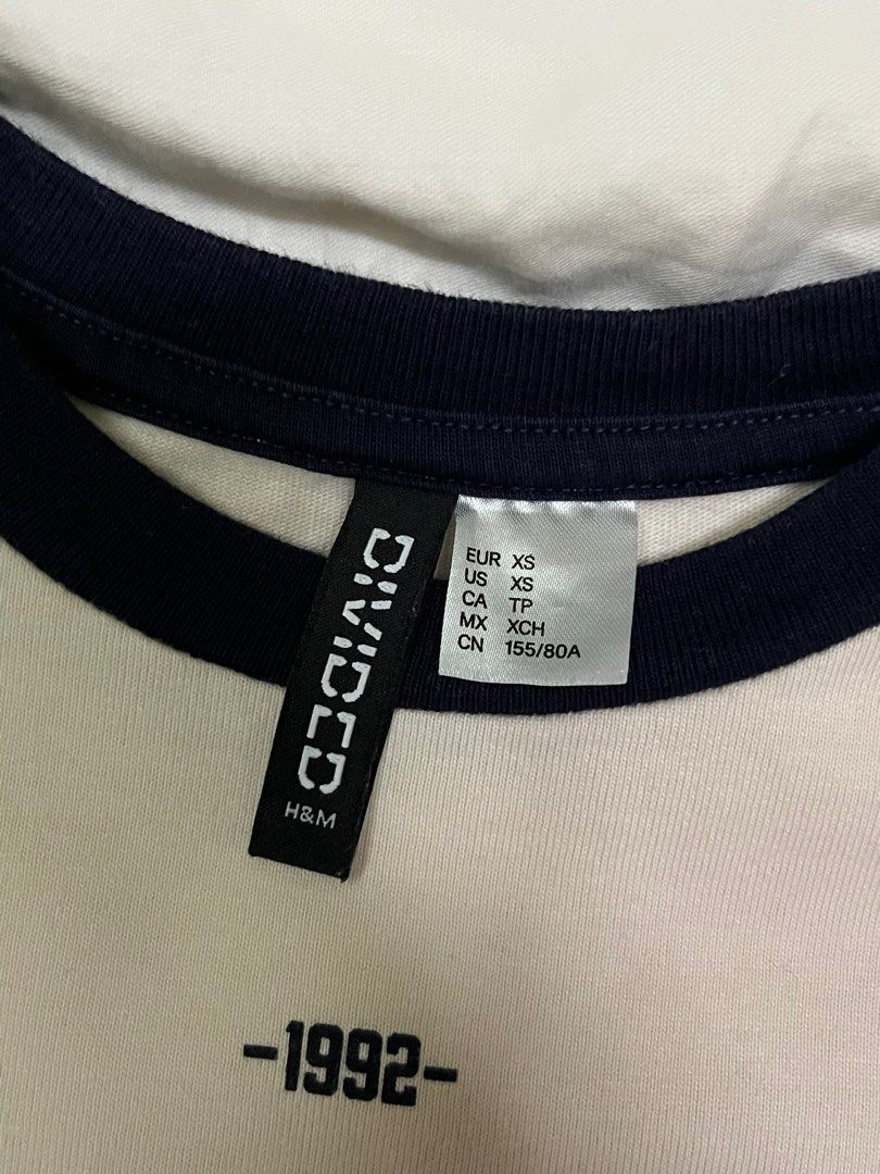 H&M Divided Baby Tee (Category: Shirts) located in Angeles City. Submitted by yna.declutter (Listing ID 1408425990, Image 2). Description: 💟 used but not abused 💟 bought it for 699 on h&m 💟 color cream 💟 rfs: declutterring 💟 payment first / gcash .