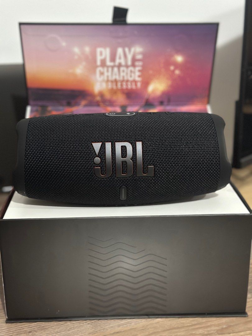 JBL Charge 5 Bluetooth Speaker (Category: Soundbars, Speakers & Amplifiers) located in Taguig. Submitted by graceeeee. (Listing ID 1408388321, Image 2). Description: - JBL Charge 5 Bluetooth speaker - Black color - Portable design - Original packaging included - Features Bluetooth V5.1 - Long-lasting battery - Used once to check - Bought from SM Appliance Location: near Venice Grand Canal Mall Shipping: Grab, Lalamove, or J&T.