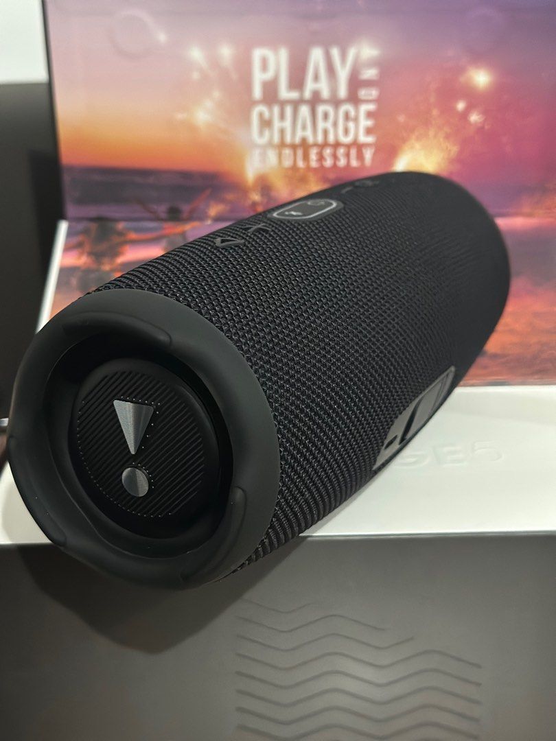 JBL Charge 5 Bluetooth Speaker (Category: Soundbars, Speakers & Amplifiers) located in Taguig. Submitted by graceeeee. (Listing ID 1408388321, Image 3). Description: - JBL Charge 5 Bluetooth speaker - Black color - Portable design - Original packaging included - Features Bluetooth V5.1 - Long-lasting battery - Used once to check - Bought from SM Appliance Location: near Venice Grand Canal Mall Shipping: Grab, Lalamove, or J&T.