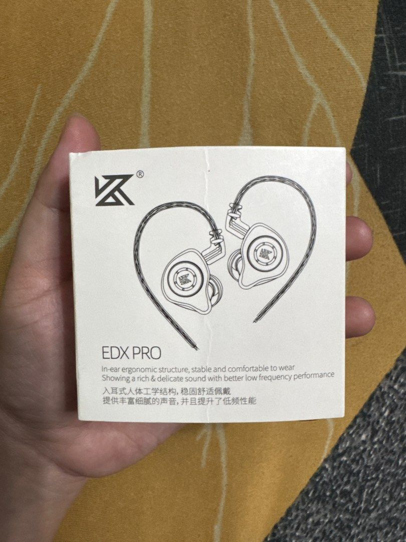 KZ EDX Pro In-Ear Earphones (Category: Earphones) located in Santa Rosa. Submitted by cozypanda (Listing ID 1408434845, Image 1). Description: KZ EDX Pro in-ear earphones. Features a 3.5mm plug type and 0.75mm pin type. The frequency range is 10-20000Hz, and the impedance is 16Ω. The sensitivity is 110±3dB/mW@1KHz. The box indicates the earphones are designed for a comfortable fit and rich sound with better low-frequency performance..