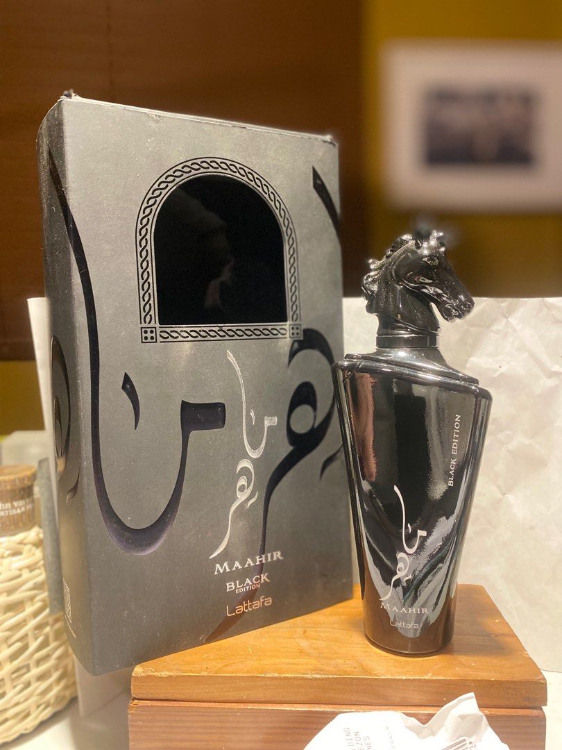 Lattafa Maahir Black Edition Eau de Parfum (Category: Fragrance & Deodorants) located in Plaridel. Submitted by marcgaba (Listing ID 1408490937, Image 2). Description: Lattafa Maahir Black Edition Eau de parfum, 100ml, see pic for level Paint near atomizer was low quality and it bubbled, so I peeled some off. Does not affect juice. Uber masculine, dark and smoky See pic for level PRICE: 1800 MOP: BPI / GCASH SHIPPING: J&T from Plaridel, Bulacan N