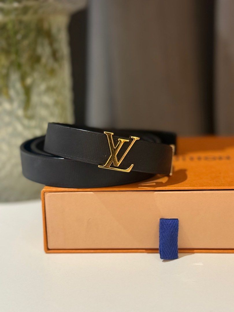 Louis Vuitton LV Initiales Belt (Category: Luxury Accessories) located in Makati City. Submitted by lulu89898989 (Listing ID 1408451064, Image 2). Description: - Authentic Louis Vuitton LV Initiales belt - Black leather strap - Gold-tone LV buckle - Includes original box - Includes dust bag - Stylish accessory.