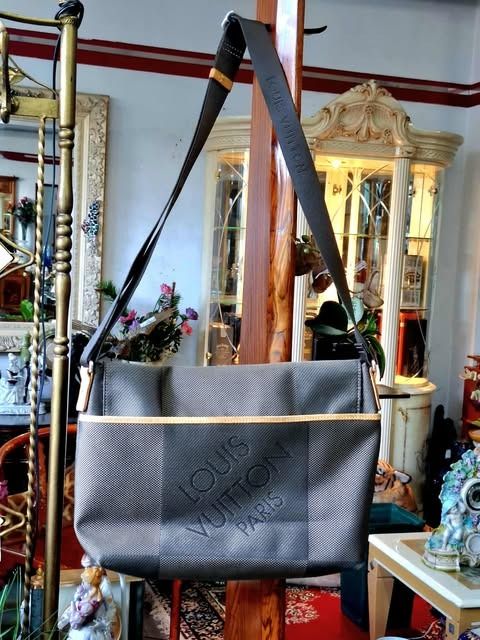 Louis Vuitton Terre Damier Geant (Category: Luxury Bags & Wallets) located in Manila. Submitted by trendsettershoppe (Listing ID 1408399203, Image 3). Description: Louis Vuitton Terre Damier Geant Canvas Loup Messenger Bag or Laptop Bag. Size: 12 x 15 x 5, inches. Pre-loved. Ftom Japan.