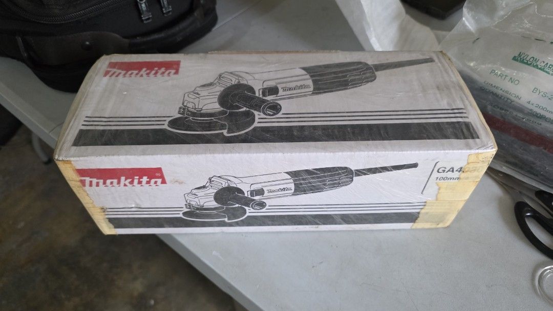 Makita GA4030 100mm Angle Grinder (Category: Construction Tools & Equipment) located in Valenzuela. Submitted by cbcsjr (Listing ID 1408463691, Image 1). Description: - Makita GA4030 Angle Grinder - 100mm size - Brand new - Sealed box - Unused condition (likely).
