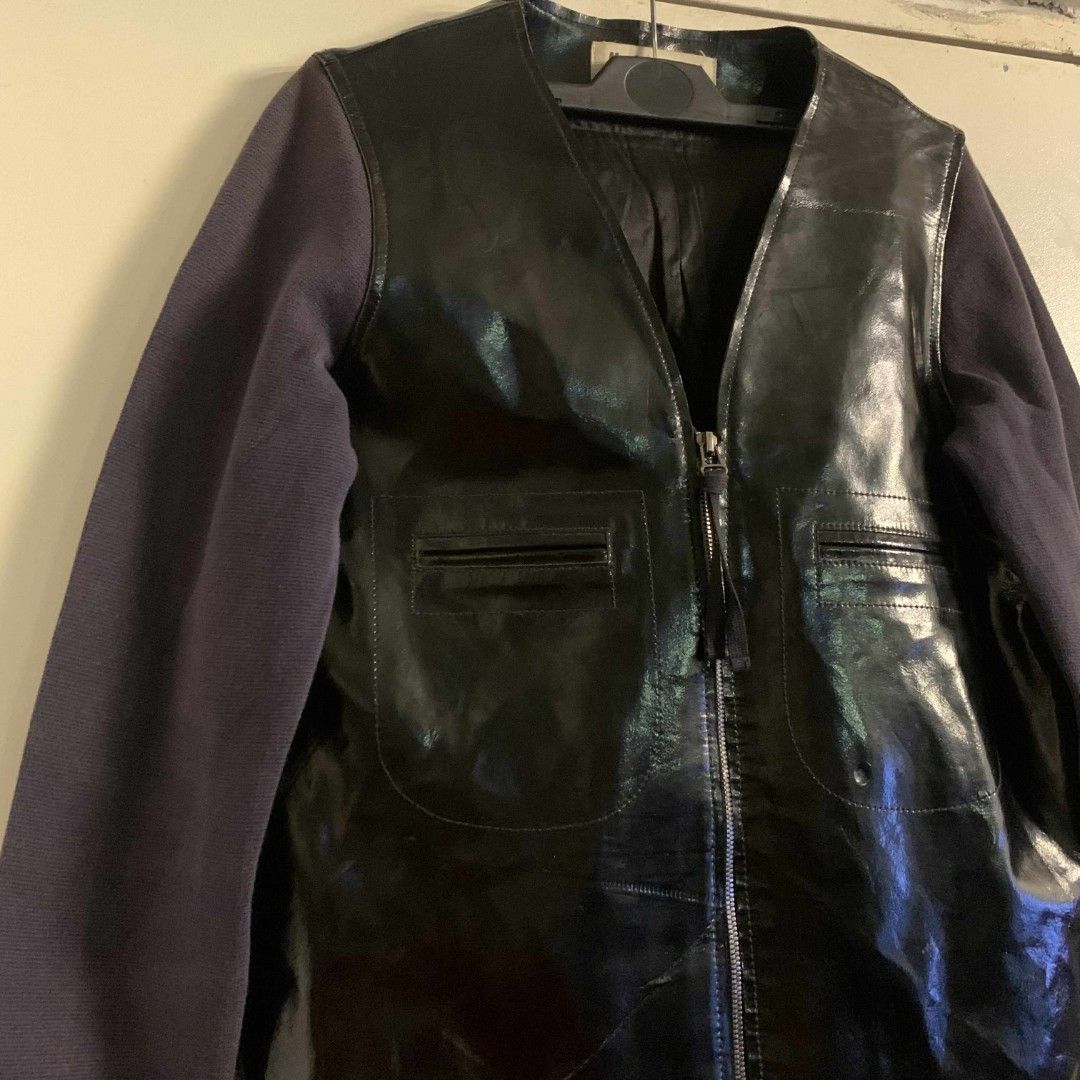 MARNI Leather Jacket (Category: Luxury Apparel) located in Carmen. Submitted by don-lean22 (Listing ID 1408475794, Image 2). Description: - Black leather jacket with contrasting fabric. - Zip closure and two front pockets. - Ribbed hem and cuffs. - Size: EUR 38, US 8, CA 8, CN 165/88A. - Made in China..