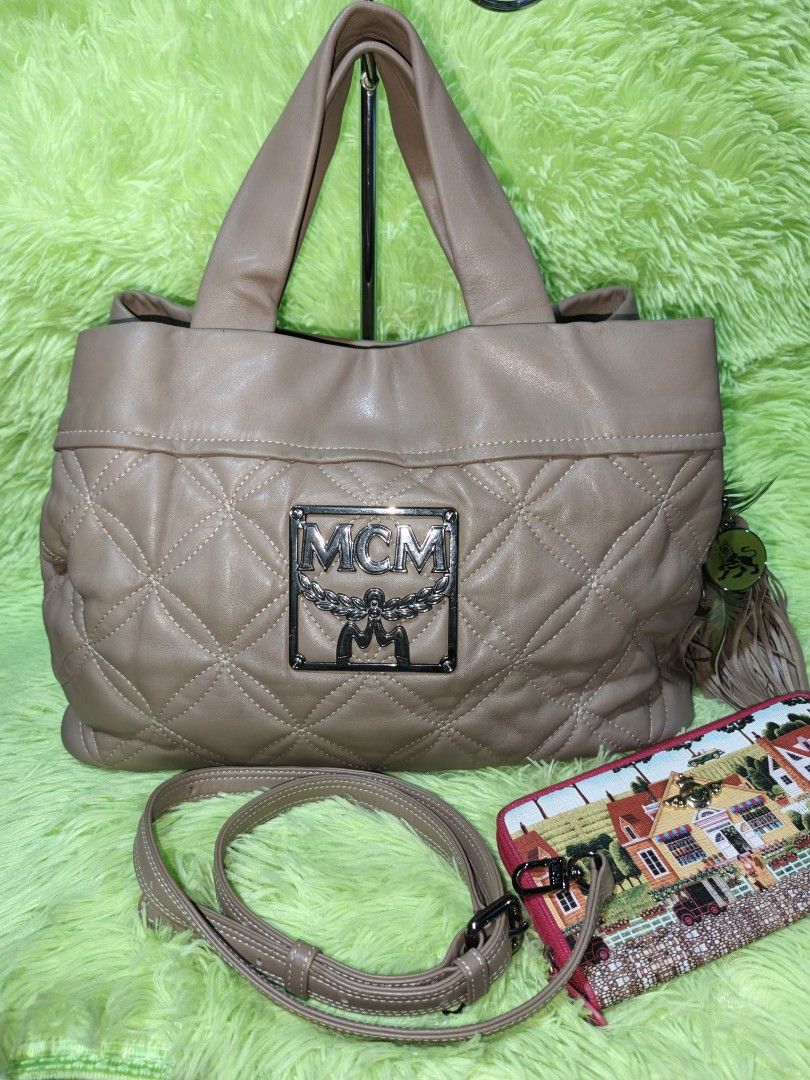 Mcm two way bag (Category: Luxury Bags & Wallets) located in Davao. Submitted by ukaystuff07 (Listing ID 1408477225, Image 1). Description: Preloved from korean box >leather >naiikot and with etiketa >excellent condition >very small stain inside upper part ng zipper.