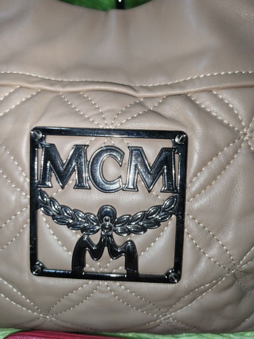 Mcm two way bag (Category: Luxury Bags & Wallets) located in Davao. Submitted by ukaystuff07 (Listing ID 1408477225, Image 3). Description: Preloved from korean box >leather >naiikot and with etiketa >excellent condition >very small stain inside upper part ng zipper.