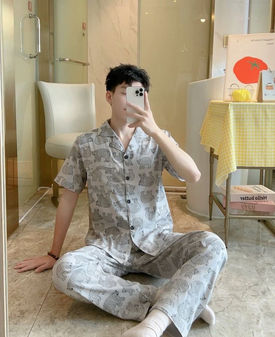 Men's Short Sleeve Pajama Set (Category: Undergarments & Loungewear) located in Manila. Submitted by rocillocin64338 (Listing ID 1408343478, Image 2). Description: - Men's pajama set - Includes a short-sleeved button-down shirt and matching pants - Available in various patterns (stripes, stars, etc.) - Shirt features a collar and chest pocket - Loose-fitting pants for comfort - Perfect for sleeping or lounging.