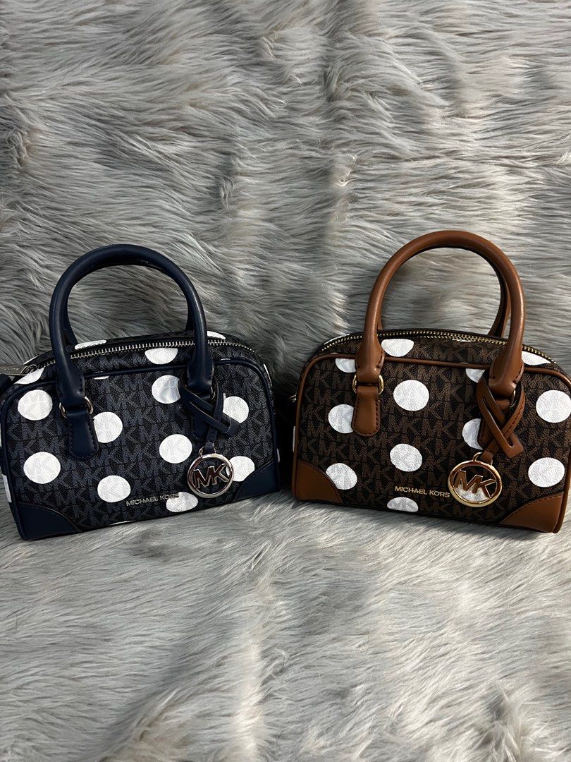 MK THOMPSON POLKA DUFFLE (Category: Luxury Bags & Wallets) located in Quezon City. Submitted by ellastore (Listing ID 1408474659, Image 1). Description: MK MINI DUFFLE ❌ NAVY ❌ & ✅MONO BROWN✅ BRANDNEW.