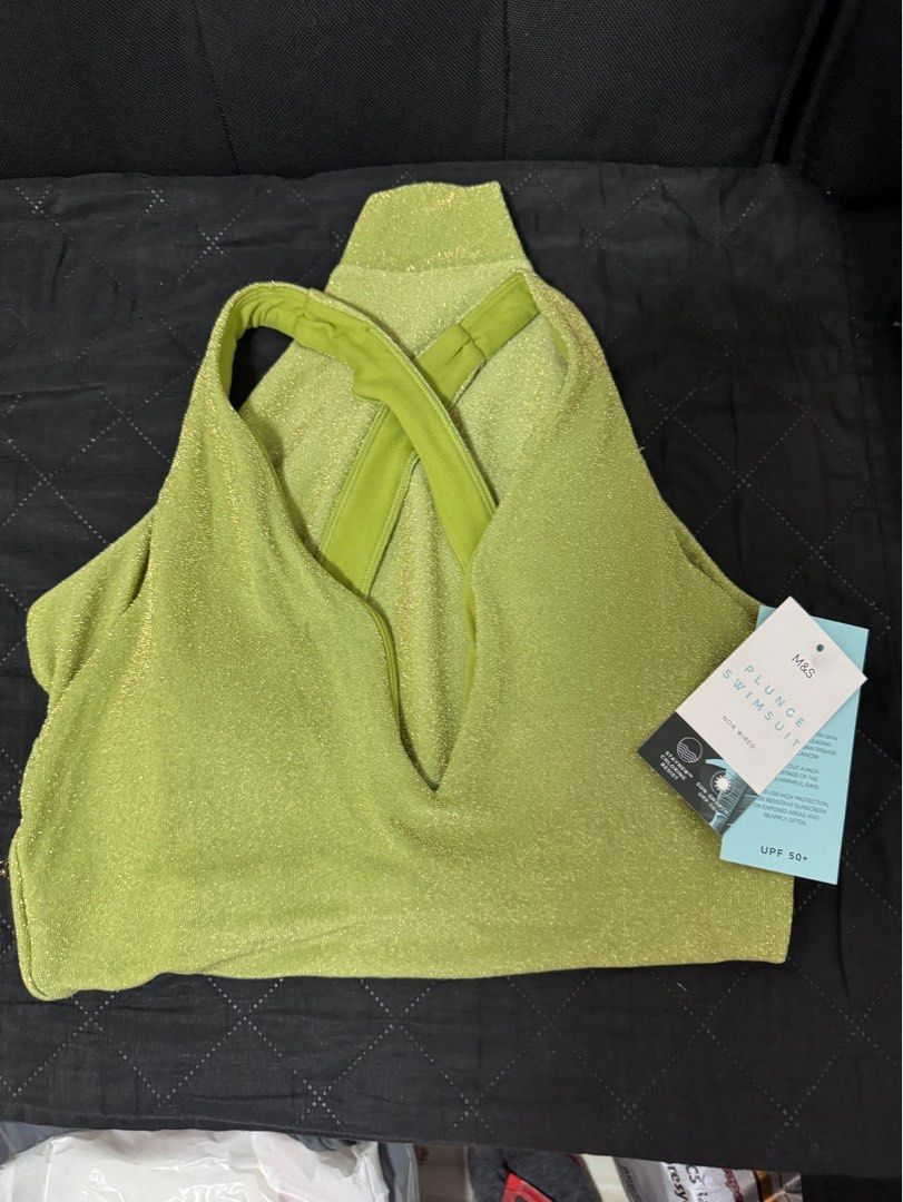 M&S Sparkle Plunge Swimsuit (Category: Bikinis & Swimsuits) located in Quezon City. Submitted by andreaeliz (Listing ID 1408345538, Image 3). Description: - M&S swimsuit - Stylish plunge neckline - Unique cross-back design - Vibrant green color with subtle sparkle - UPF 50+ sun protection - Non-wired for comfort - Perfect for your beach trip - Original price P2950.