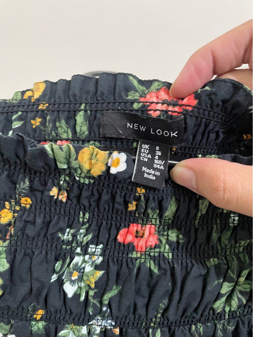 New Look Floral Off-Shoulder Top (Category: Blouses) located in Tiaong. Submitted by pengdwin (Listing ID 1408354011, Image 2). Description: - New Look off-shoulder top - Black background with floral print - Long sleeves - Smocked neckline - Size: UK 8, EUR 36, USA 4, CN 160/84A - Made in India.