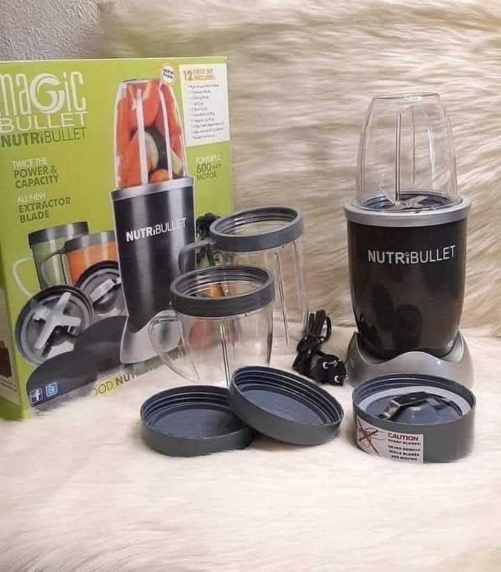 Nutribullet 600 Watts (Category: Juicers, Blenders & Grinders) located in Manila. Submitted by redonlineshop (Listing ID 1408301356, Image 1). Description: Nutribullet 600 Watts ₱1350 Wattage Output: 600 Watts Number of Speeds: 1 Capacity (volume): 3 Cups Appliance Capabilities: Shredder, Blends, Grinds, Chops Material: Plastic (BPA-Free) Care and Cleaning: Dishwasher Safe Parts Base Dimensions: 5.375" Diameter x 8" Height Weight: 3.6 lbs A nutri