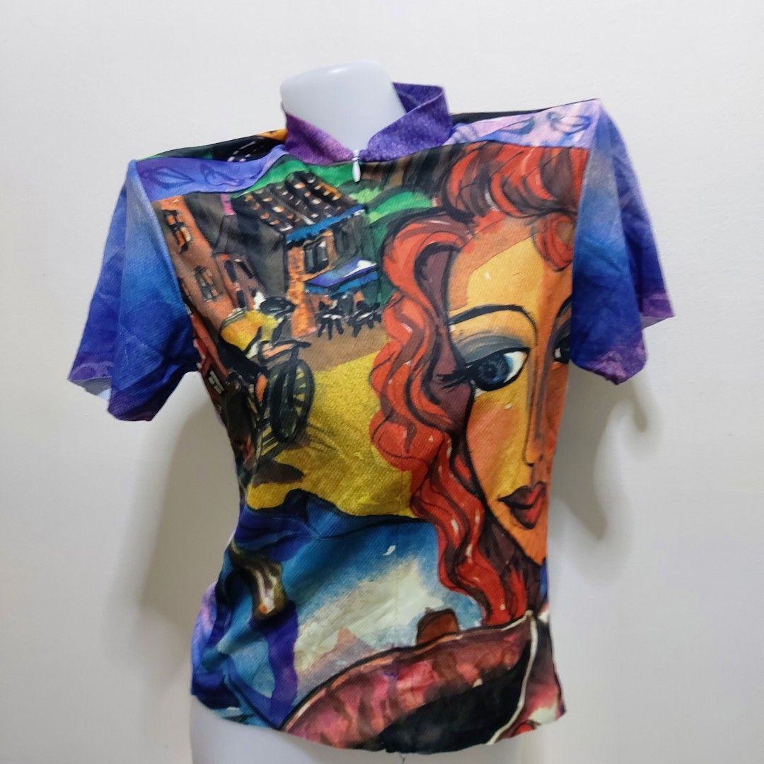 Opal Izumi Women's Small Top (Category: Sleeveless) located in Muntinlupa City. Submitted by rigoutmafia (Listing ID 1408457587, Image 1). Description: - Opal Izumi women's top - Size: Small - Features a vibrant, artistic print with blue, purple, yellow, and orange colors - Made in the USA - Lightweight fabric, ideal for warmer weather - issue : cut yun lower part na garter.