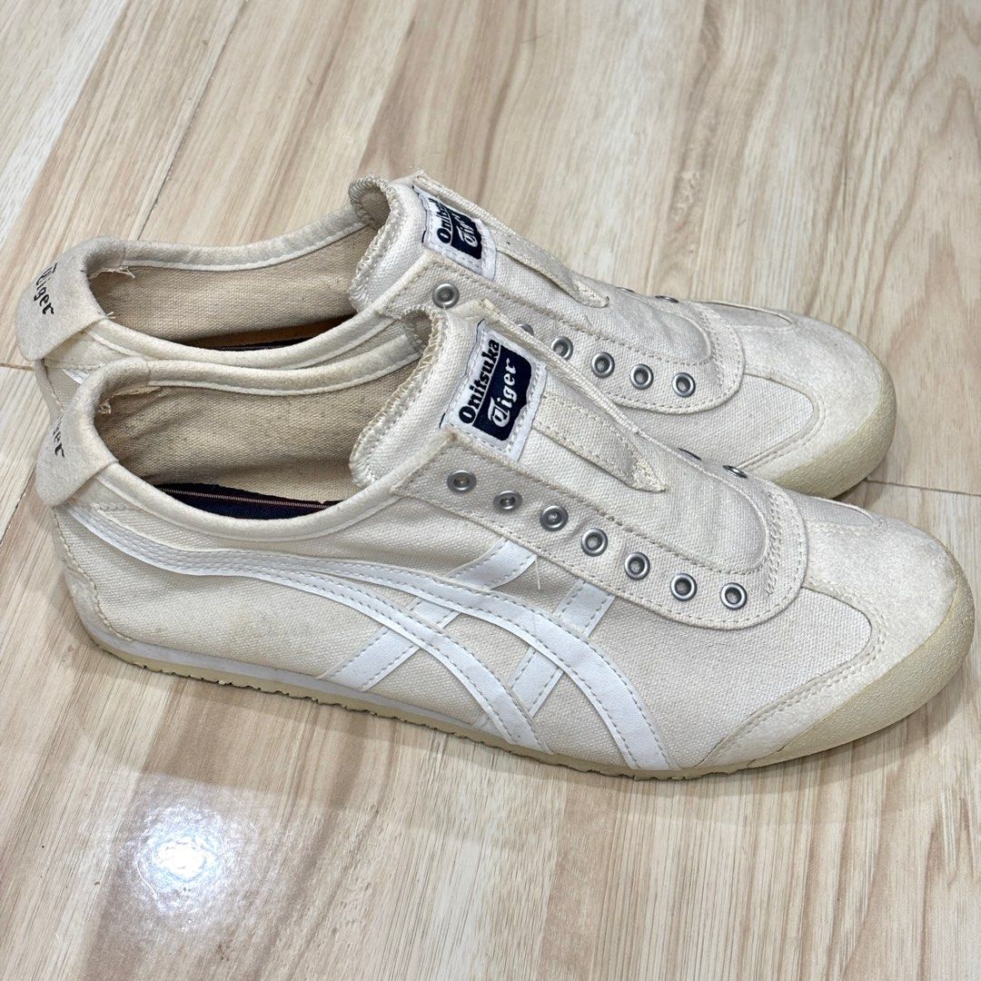 Original Onitsuka Tiger Slip-On Sneakers (Category: Sneakers) located in Digos. Submitted by rara031 (Listing ID 1408482026, Image 1). Description: - Onitsuka Tiger slip-on sneakers - Color: Cream - Size: EUR 42 / US 8.5 / UK 7.5 - Features Onitsuka Tiger logo - Canvas upper with white stripes - Rubber soles - Pre-owned, Twice used only! Rfs: declutter 📍davao del sur .