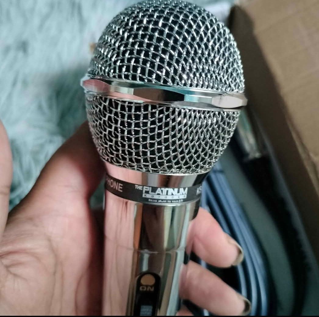 Original Platinum KS-E700 Professional Dynamic Microphone (Category: Microphones) located in Caloocan City. Submitted by youngdog_7a3ee7 (Listing ID 1408314931, Image 3). Description: KS-E700 professional dynamic microphone comes with a cable. It has an on/off switch and a silver finish. The microphone is labeled "The Platinum Series". The box is also included. The cable has a 6.35mm jack and an XLR connector..