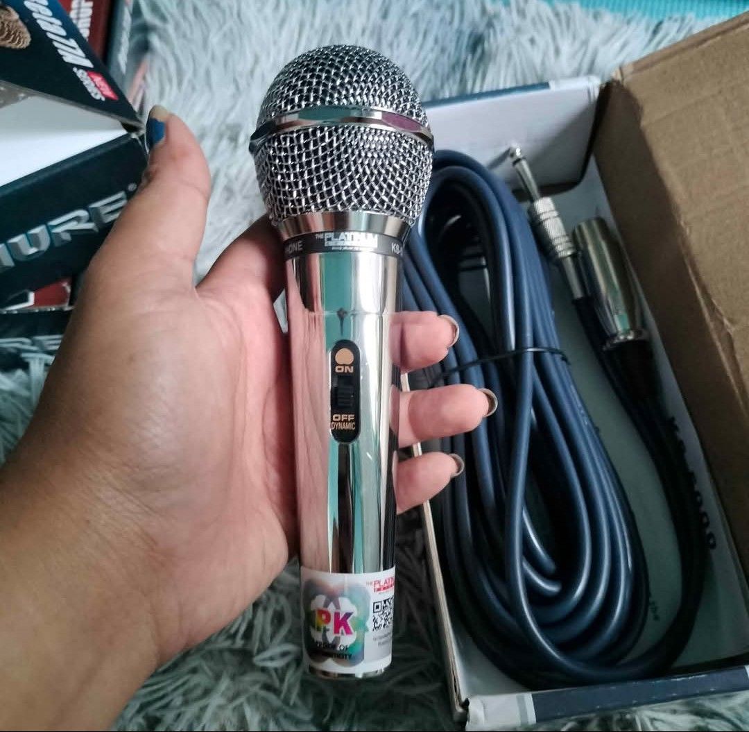 Original Platinum KS-E700 Professional Dynamic Microphone (Category: Microphones) located in Caloocan City. Submitted by youngdog_7a3ee7 (Listing ID 1408314931, Image 1). Description: KS-E700 professional dynamic microphone comes with a cable. It has an on/off switch and a silver finish. The microphone is labeled "The Platinum Series". The box is also included. The cable has a 6.35mm jack and an XLR connector..