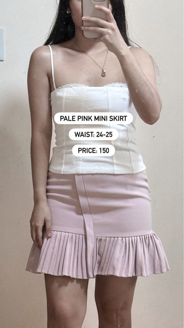 Pale Pink Mini Skirt (Category: Skirts) located in Cabuyao City. Submitted by coffeeandclothes_ (Listing ID 1408487818, Image 1). Description: - Pale pink mini skirt - Waist: 24-25 inches - Pleated hem - Unique wrap detail - Perfect for casual/semi-formal wear - Price: 150 pesos.