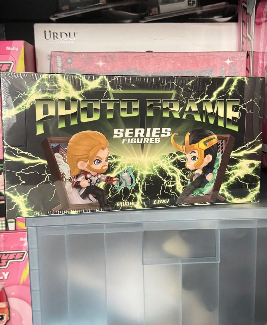 Popmart Marvel Photo Frame Series (Category: Designer & Blind Box Toys) located in Paranaque City. Submitted by gaftumar (Listing ID 1408323620, Image 1). Description: - Brand new, sealed in box - Features Thor and Loki in a battle scene - Photo frame design.