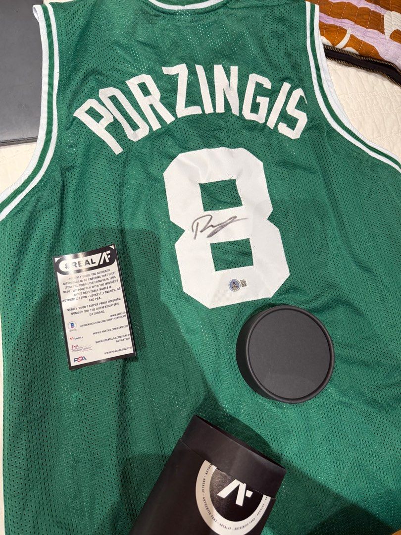 Signed Kristaps Porzingis Boston Celtics Jersey (Category: Activewear) located in Makati City. Submitted by inezlebron (Listing ID 1408425164, Image 1). Description: - Authentic Kristaps Porzingis Boston Celtics jersey - Size: XL - Features Porzingis's name and number 8 - Hand-signed - Includes Authentic Fans certificate of authenticity - Comes with a protective tube.