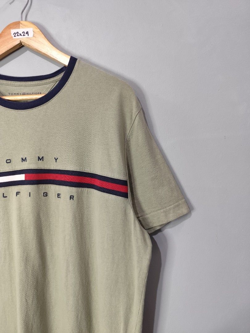 Tommy Hilfiger Tuni logo Olive Green (Category: Tshirts & Polo Shirts ) located in Argao. Submitted by cobeevans (Listing ID 1408476914, Image 3). Description: ◾👕◾ Dimes: 22x29 / fit L-semi xl Condition: Good Asnew Cr: 9.5/10 Issue: ❌ Price: 500💸💸💸 Disclaimer: We are not affiliated with any brands trademark. The product we offer are Thrifted pre owned items originally. manufactured by these brand.all trademarks logos and copyright belongs to 