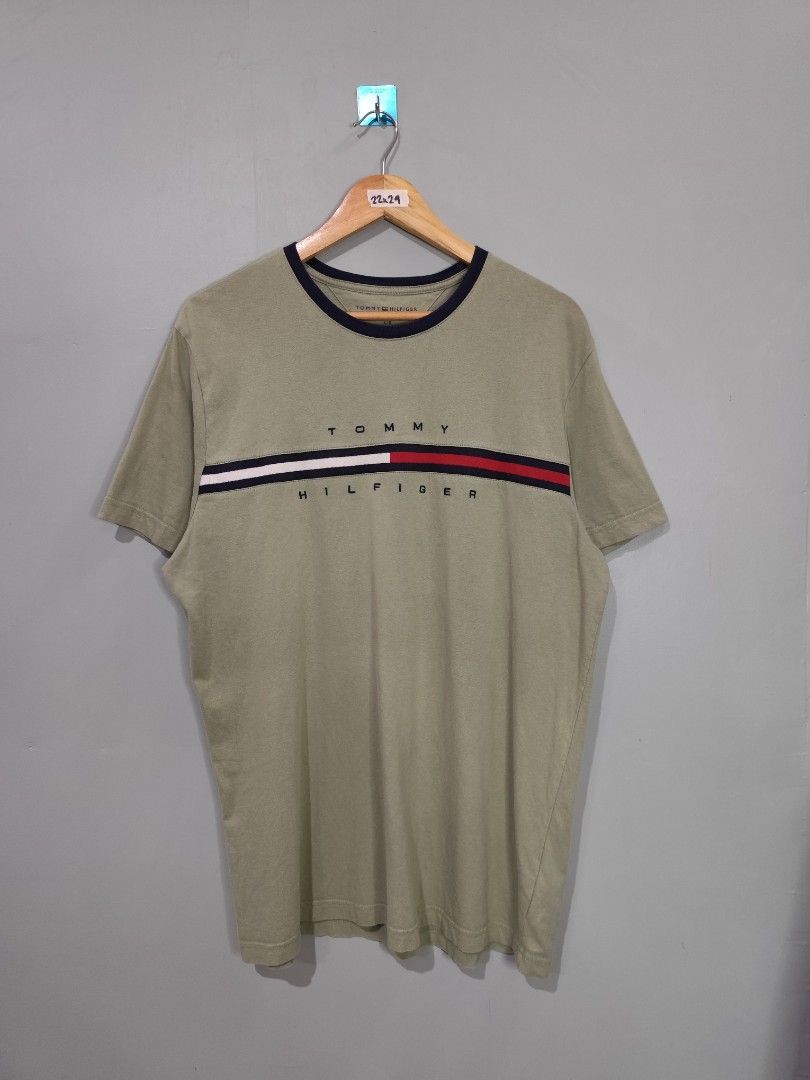 Tommy Hilfiger Tuni logo Olive Green (Category: Tshirts & Polo Shirts ) located in Argao. Submitted by cobeevans (Listing ID 1408476914, Image 2). Description: ◾👕◾ Dimes: 22x29 / fit L-semi xl Condition: Good Asnew Cr: 9.5/10 Issue: ❌ Price: 500💸💸💸 Disclaimer: We are not affiliated with any brands trademark. The product we offer are Thrifted pre owned items originally. manufactured by these brand.all trademarks logos and copyright belongs to 