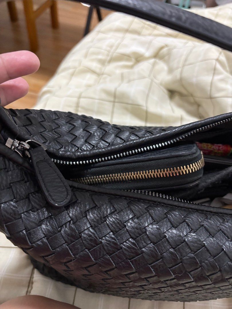 Wooven Intrecciato Hobo Bag (Category: Luxury Bags & Wallets) located in Cavite. Submitted by mvc.9619b8 (Listing ID 1408352024, Image 3). Description: - Ala Bottega Veneta hobo bag - Excellent condition no issues - Intrecciato woven leather design - Classic black color - Secure zippered closure - Comfortable shoulder strap.