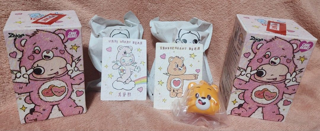 Zsiga x Care Bears Figure - POP MART (Category: Designer & Blind Box Toys) located in Antipolo. Submitted by jemmiiieee (Listing ID 1408353021, Image 1). Description: Zsiga × Care Bears Series Figures - True Hear Bear - Tender Heart Bear - P700ea, P1,200 for set - Willing to trade both for Love-A-Lot Bear (Sealed foil please) - Fresh pull from PopMart Makati - Box opened from the bottom Loc: BGC / Masinag Mod: lalamove / jnt / ggx Mop: gcash / ma