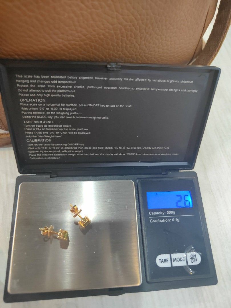 18K REAL GOLD W/BIRTH STONE (Category: Earrings) located in Antipolo. Submitted by aphroditebeautycollection (Listing ID 1396639792, Image 3). Description: Pawnable 18K Real Gold w/ BirthStone Bought it for 18,200 selling for 15,400 slightly nego RFS: URGENTLY NEED CASH.