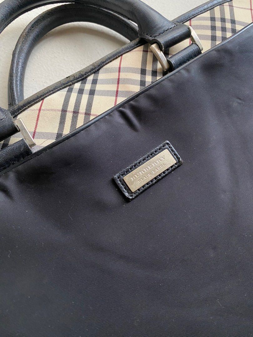 Authentic Burberry Black Label Office Laptop Bag (Category: Luxury Bags & Wallets) located in Mandaluyong City. Submitted by wear_your_style (Listing ID 1408545122, Image 3). Description: Bought in Japan, I think sa Bookoff, thus the Black Label. Semi-structured bag na maraming compartments so marami ka malagay. May zipped compartment sa front puwede mo lagyan pens, etc; main zipped compartment, very roomy, kasya laptop, then may zipped secret po