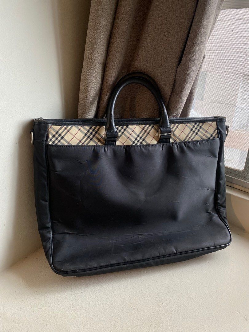 Authentic Burberry Black Label Office Laptop Bag (Category: Luxury Bags & Wallets) located in Mandaluyong City. Submitted by wear_your_style (Listing ID 1408545122, Image 2). Description: Bought in Japan, I think sa Bookoff, thus the Black Label. Semi-structured bag na maraming compartments so marami ka malagay. May zipped compartment sa front puwede mo lagyan pens, etc; main zipped compartment, very roomy, kasya laptop, then may zipped secret po